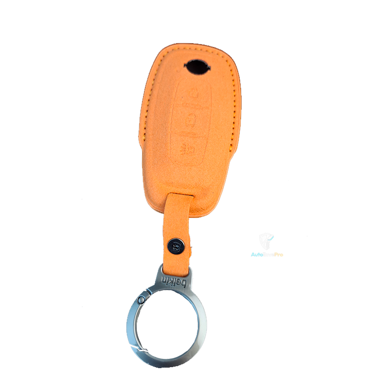 Funda protectora cuero gamuza Smart Key Nissan 3 botones color naranja herraje metálico.